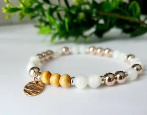 Bracelet nacre de perle 6mm et acier rose