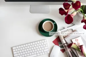 Calla Lally, Coffee & Notebook on Desktop, Stock Image