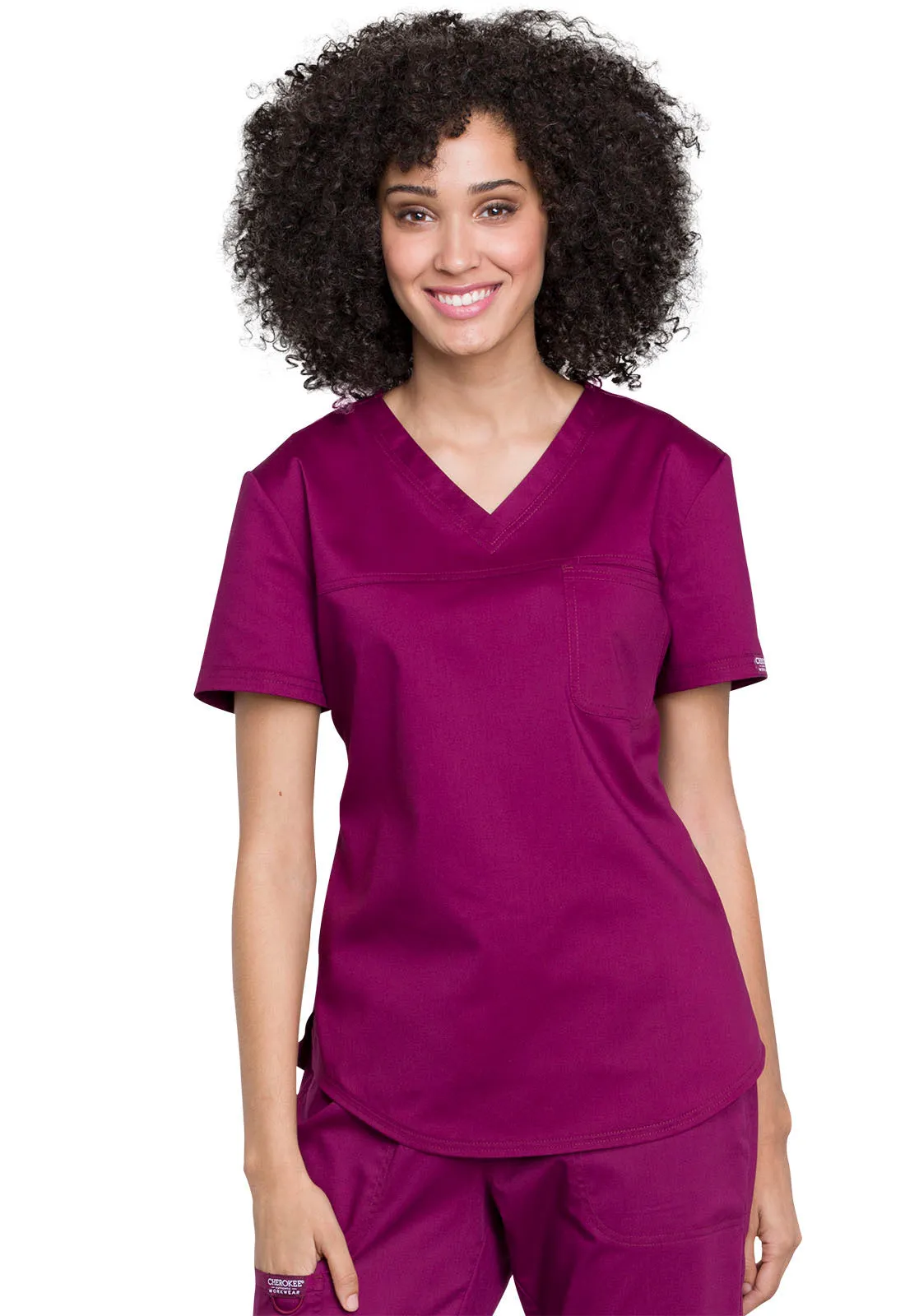 CHEROKEE REVOLUTION WOMEN'S TUCKABLE  1 POCKET V-NECK TOP