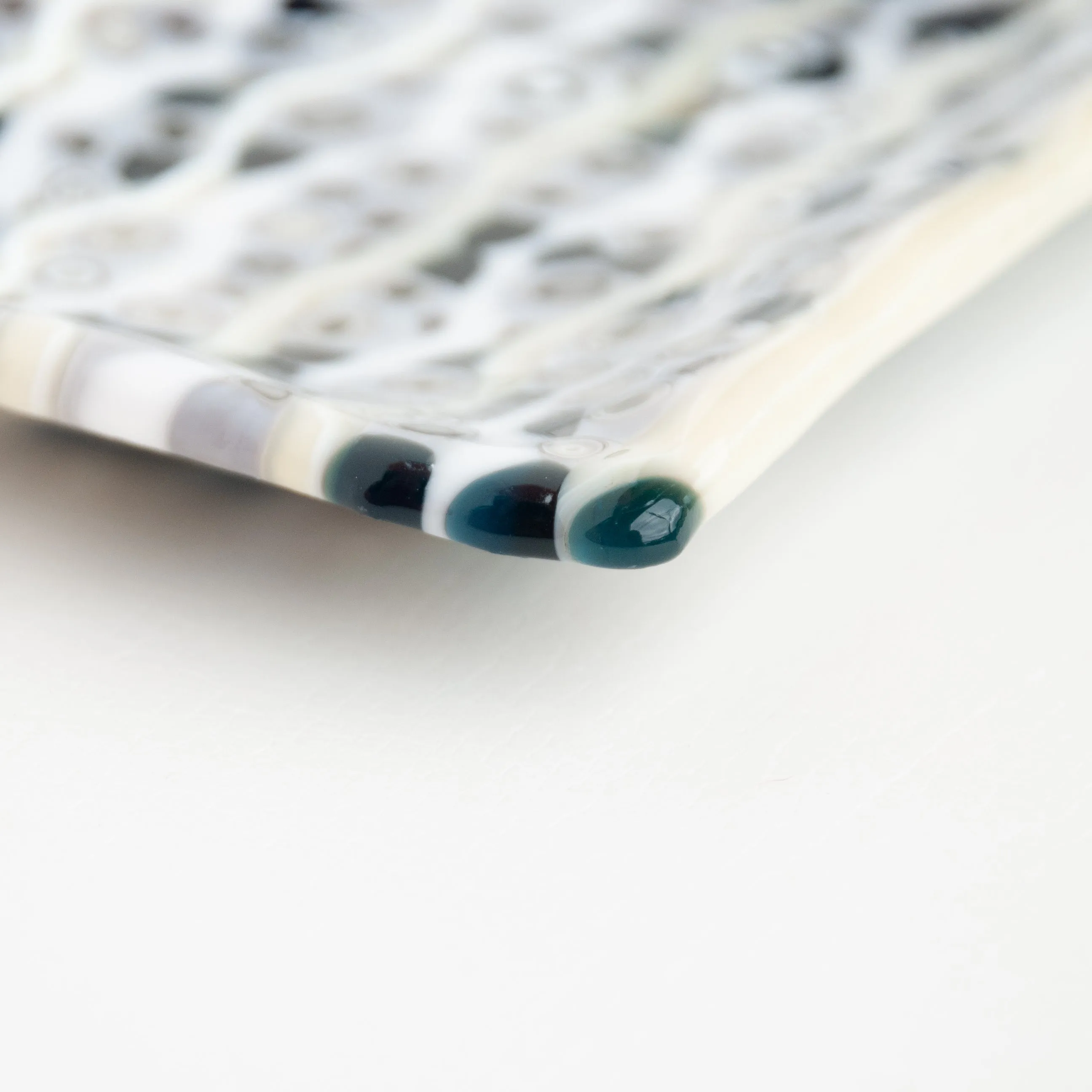 Curves with Murrini