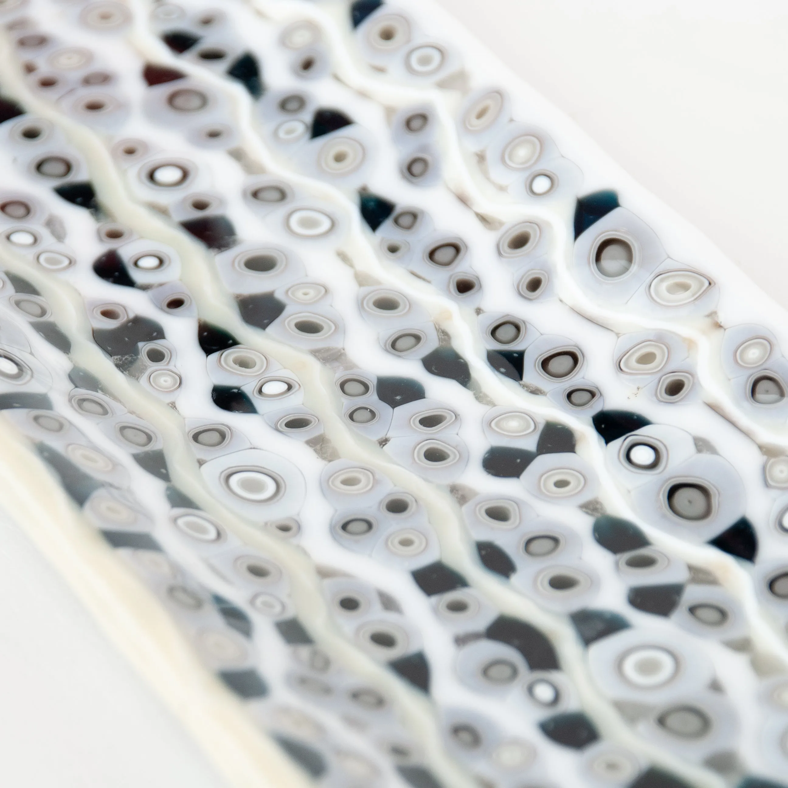 Curves with Murrini