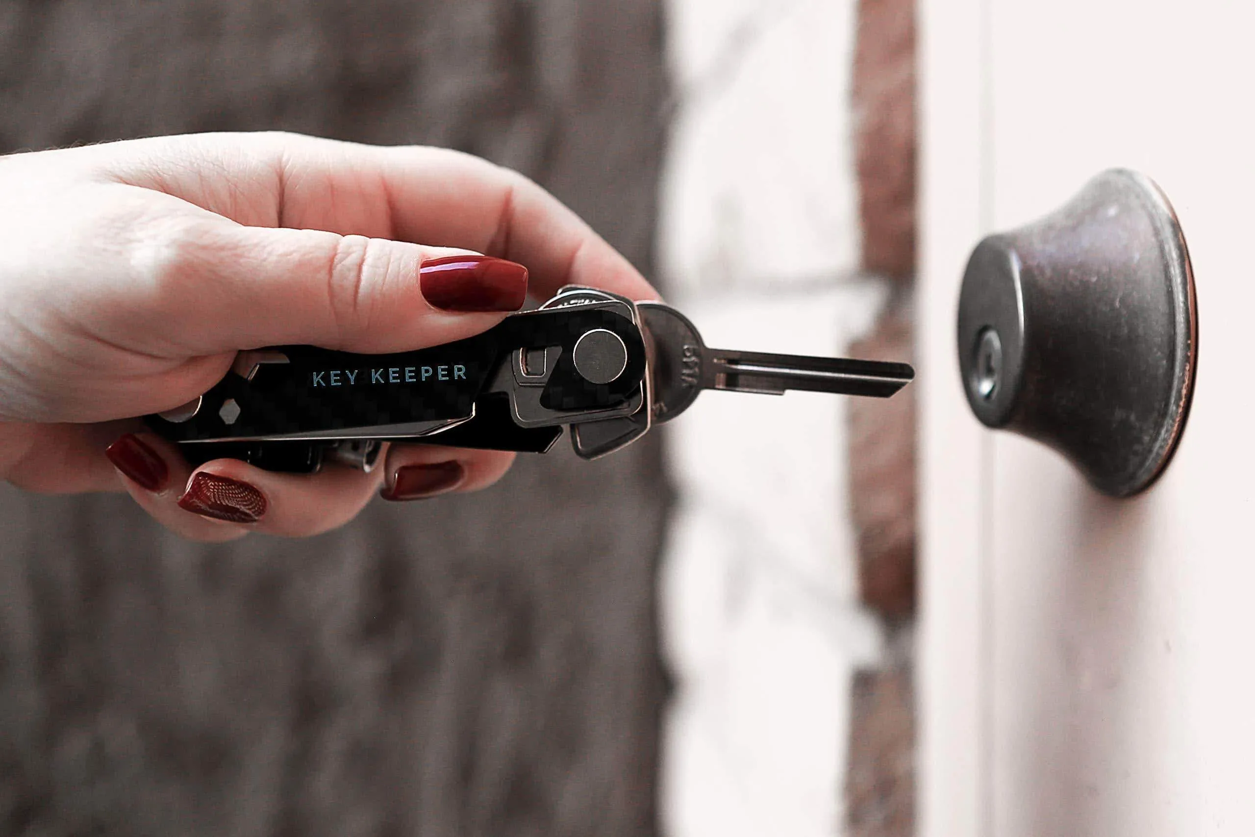 The Original Key Keeper Compact Key Organizer - Made of Carbon Fiber & Stainless Steel - LED Flashlight Key Knife Screwdriver Wrench Bottle Opener Keychain Carabiner Smart Phone Holder Holds 14 Keys