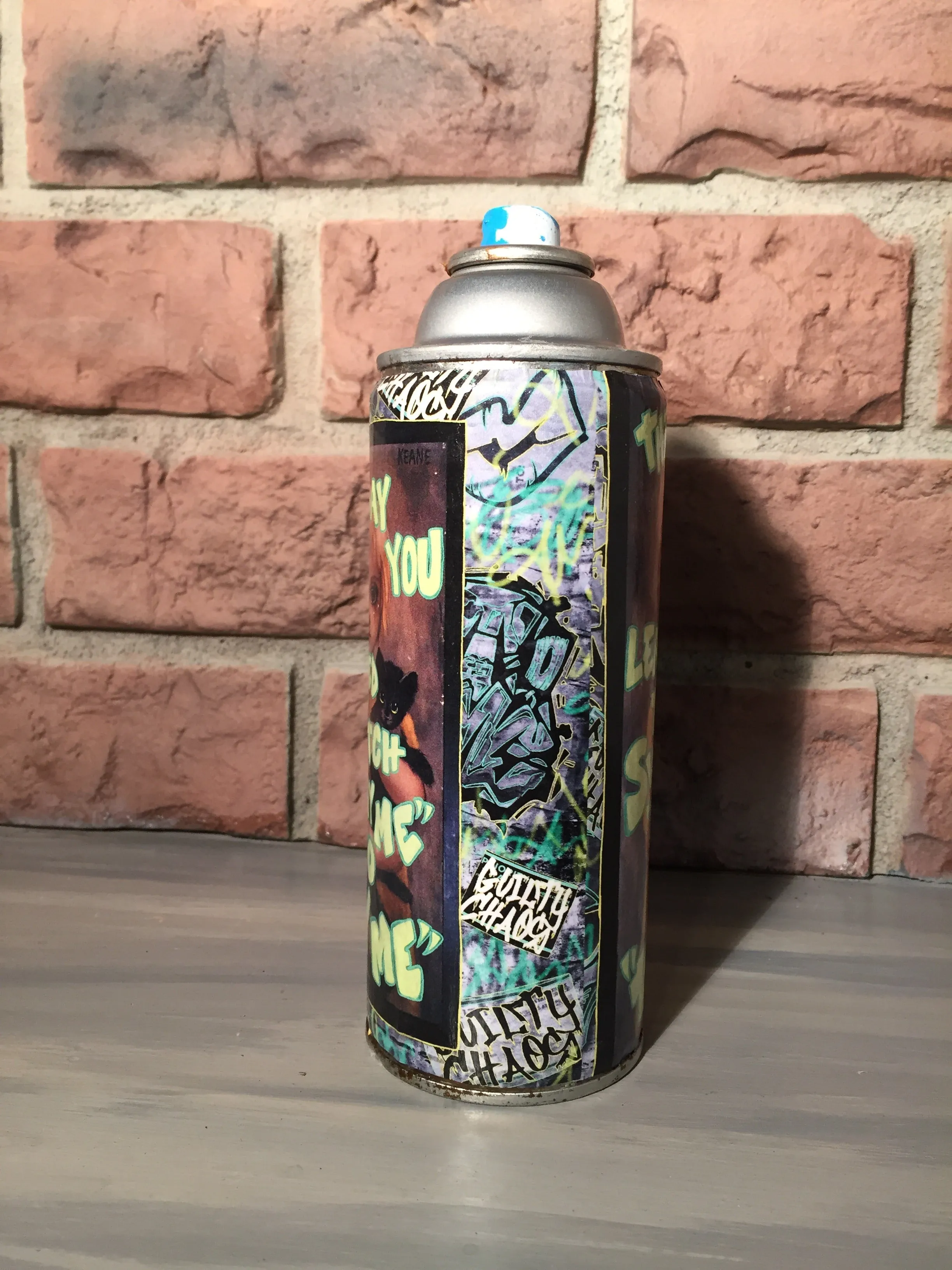 Try me print covered spray can